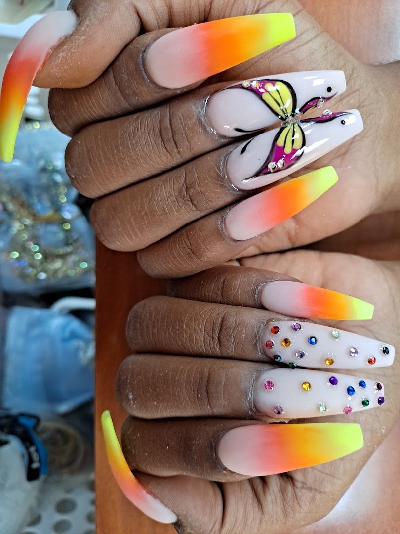 Manicured hands with glossy nail polish.