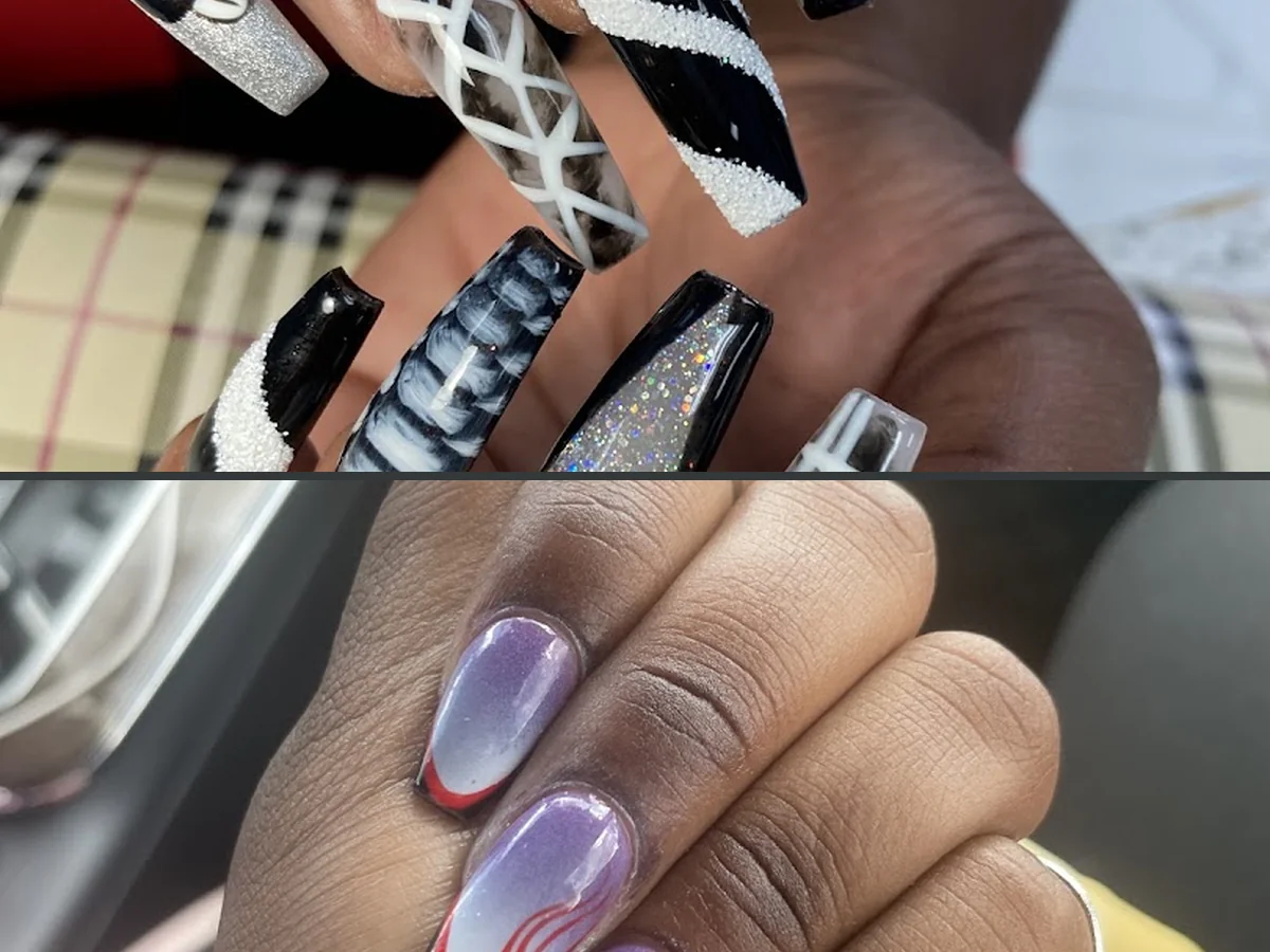 Nail technician shaping nails at a salon table.